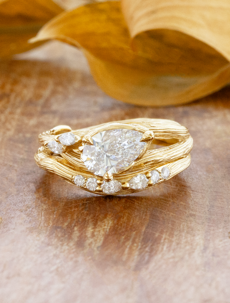caption:Shown with 1ct pear in 14k yellow gold