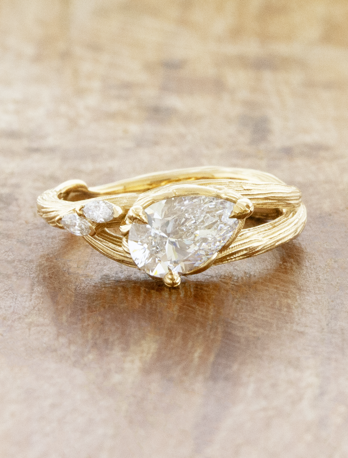 caption:Shown with 1ct pear in 14k yellow gold