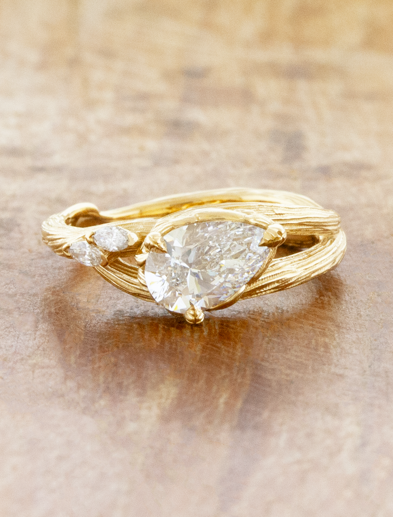 caption:Shown with 1ct pear in 14k yellow gold