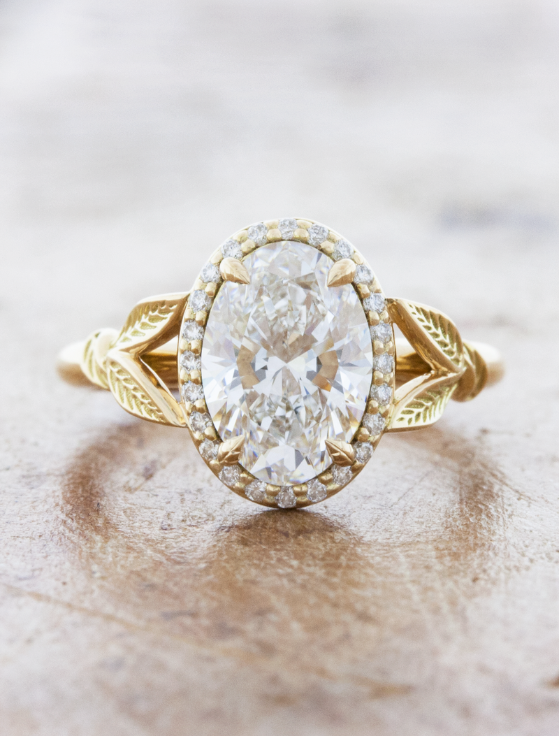 caption:Shown with 1.51ct oval diamond in 14k yellow gold