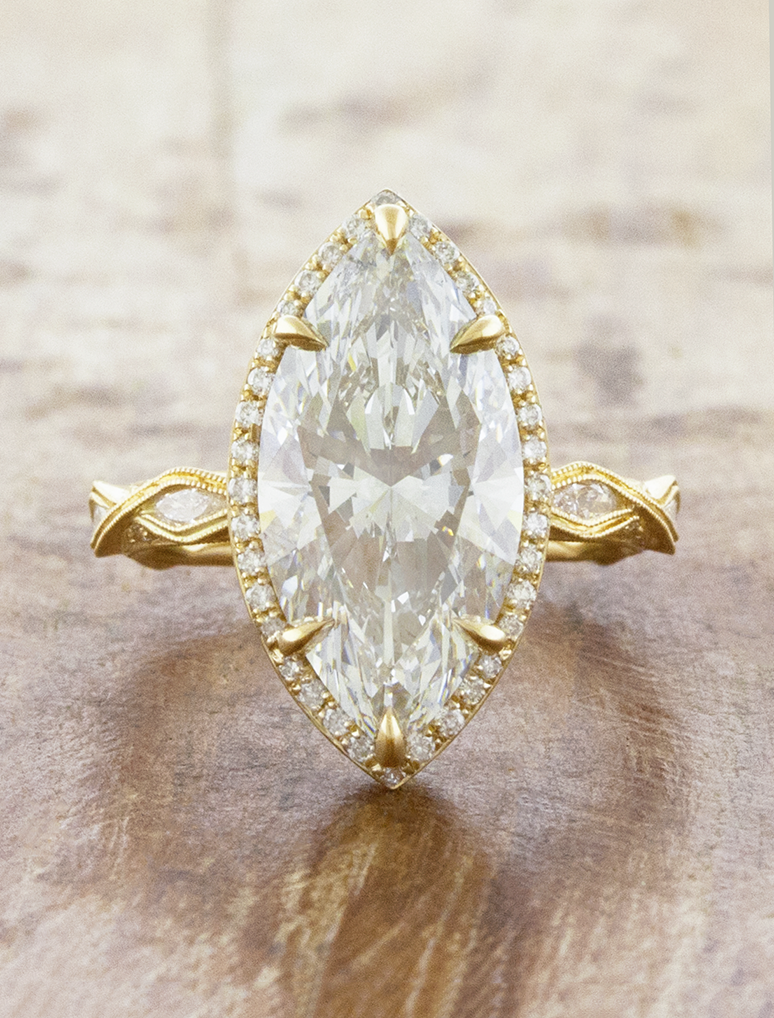 caption:Shown with 5ct marquise in 14k yellow gold
