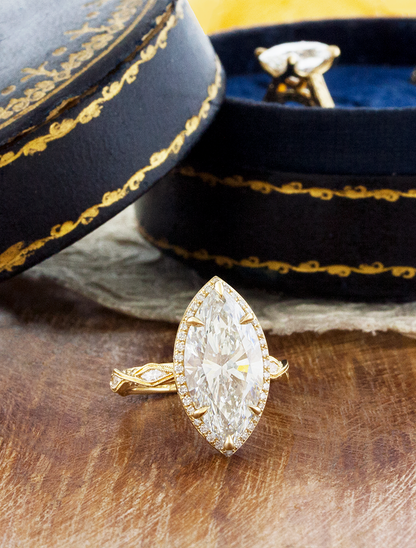 caption:Shown with 5ct marquise in 14k yellow gold
