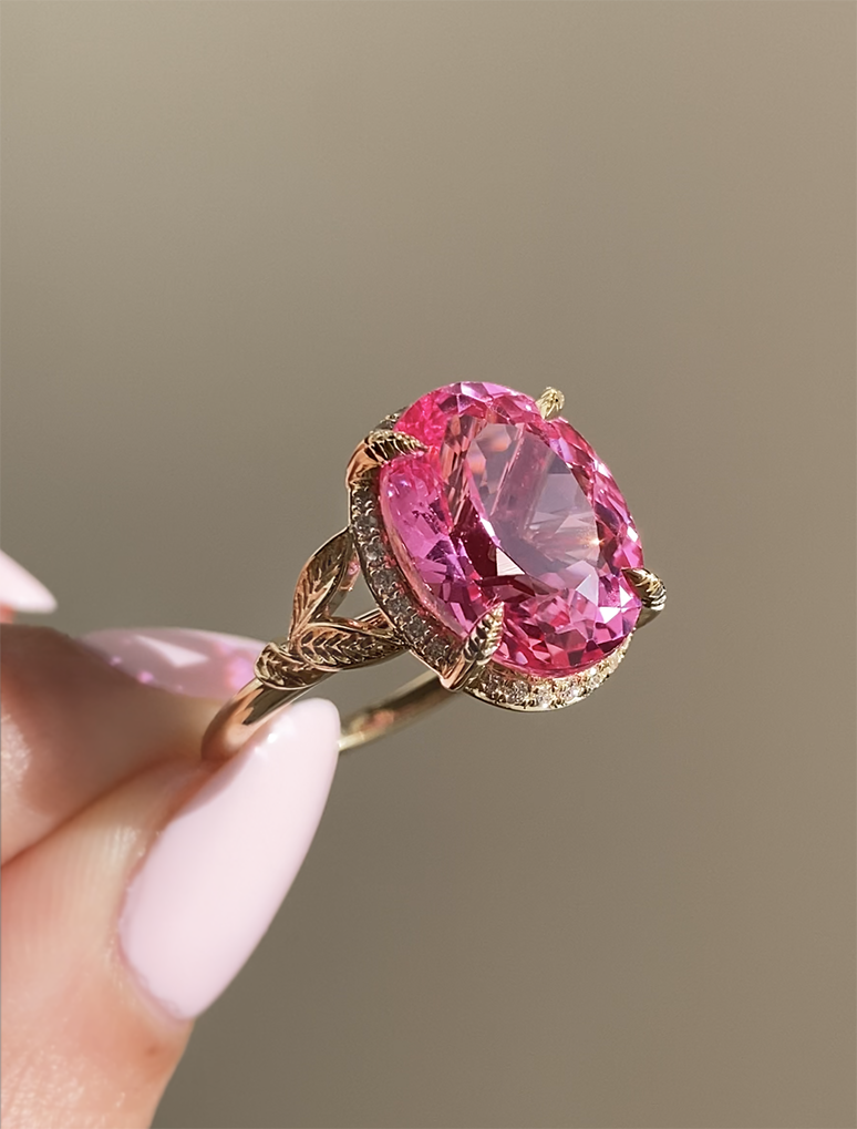caption:Customized with a 9ct Padparadscha sapphire in 14k yellow gold
