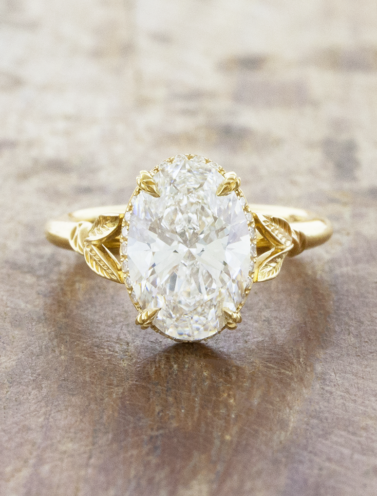 caption:Shown with 2.5ct oval in 18k yellow gold 