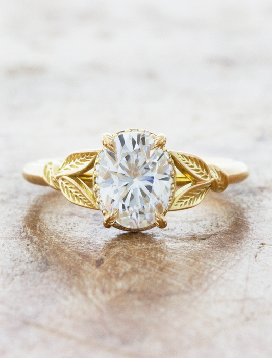 caption:Customized with 1.50ct oval moissanite in 14k yellow gold