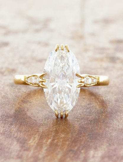 caption:Shown with 3ct oval diamond in 14k yellow gold