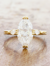 caption:Shown with 3ct marquise diamond in 14k yellow gold 