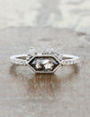 caption:Shown with rustic hexagon diamond in platinum