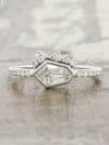 caption:Shown with hexagon diamond in platinum