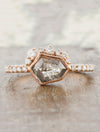 caption:Shown with 1ct hexagon rustic diamond in 14k rose gold