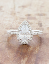 caption:Shown with 1.5ct pear in platinum