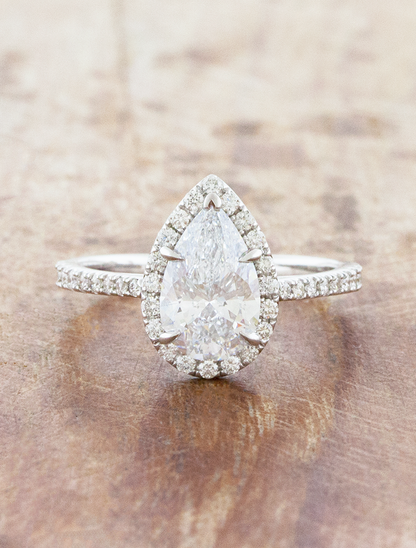 caption:Shown with 1.5ct pear in platinum