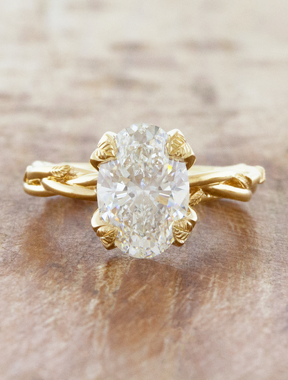 caption:Shown with 2.5ct oval in 14k yellow gold