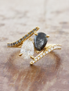 caption:Shown with 0.70ct white & grey pear diamonds in 18k yellow gold