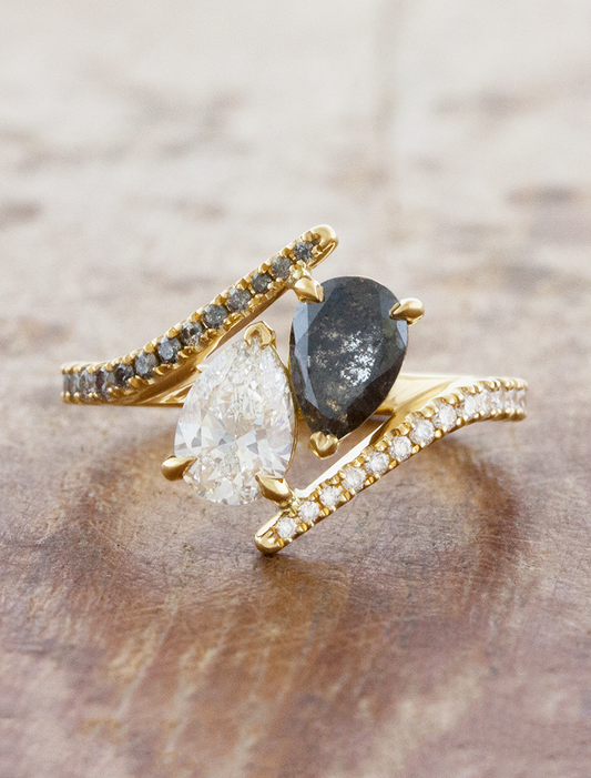 caption:Shown with 0.70ct white & grey pear diamonds in 18k yellow gold