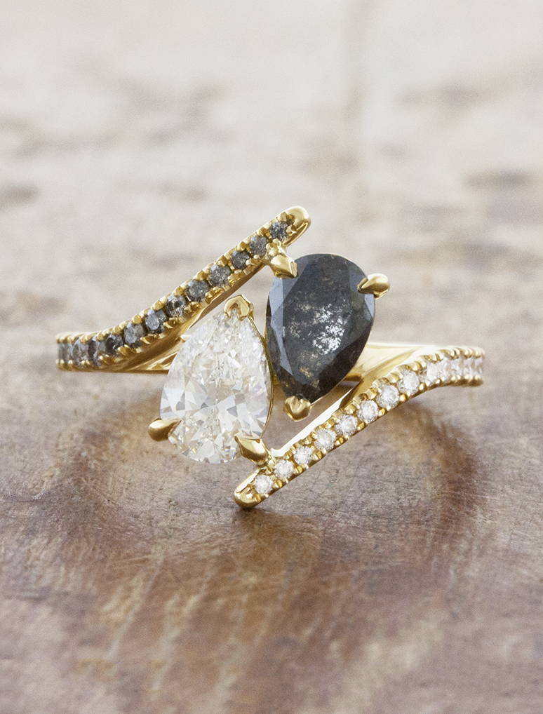 caption:Shown with 0.70ct white & grey pear diamonds in 18k yellow gold