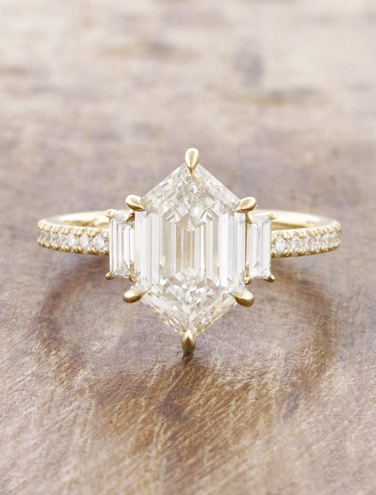 caption:Shown with 3.7ct step cut dutch marquise in 14k yellow gold 