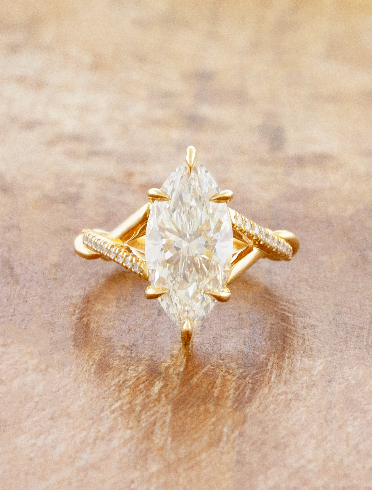 caption:Shown with 3ct marquise in 14k yellow gold