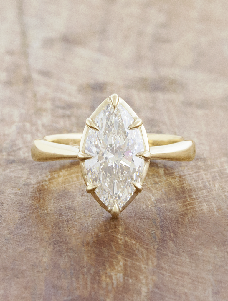 caption: Shown with 2.2ct marquise in 14k yellow gold 
