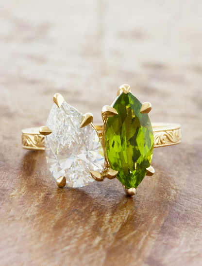 caption:Shown with 2ct pear diamond & 2.2ct marquise peridot in 18k yellow gold