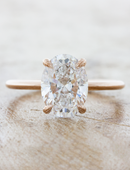 caption:2.50ct oval diamond in 14k rose gold