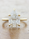 caption:Shown with 3.25ct pear diamond in 14k yellow gold