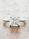 caption:Shown with 3ct cushion cut diamond in platinum
