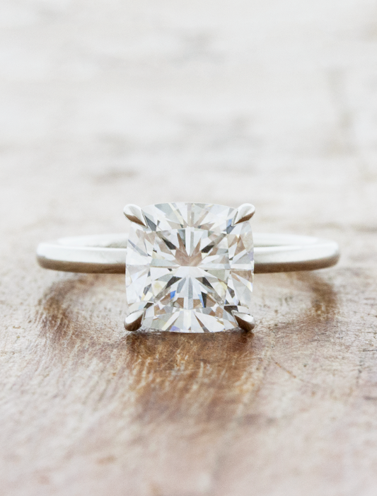caption:Shown with 3ct cushion cut diamond in platinum
