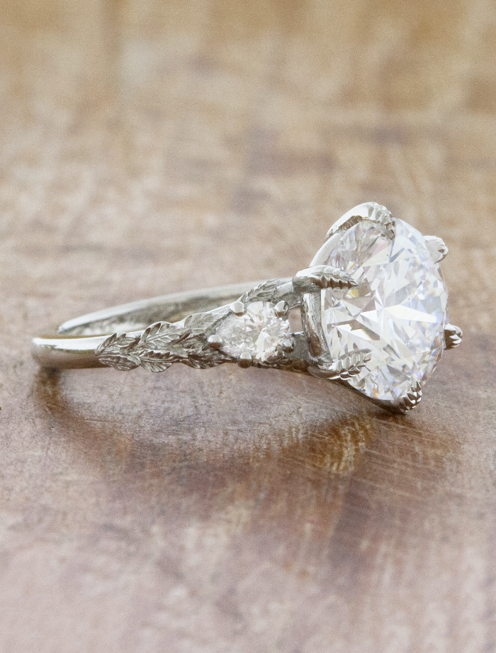 Zinnia: Nature Inspired Leaf Engraved Three Stone Engagement Zinnia: Nature Inspired Leaf Engraved Three Stone Engagement