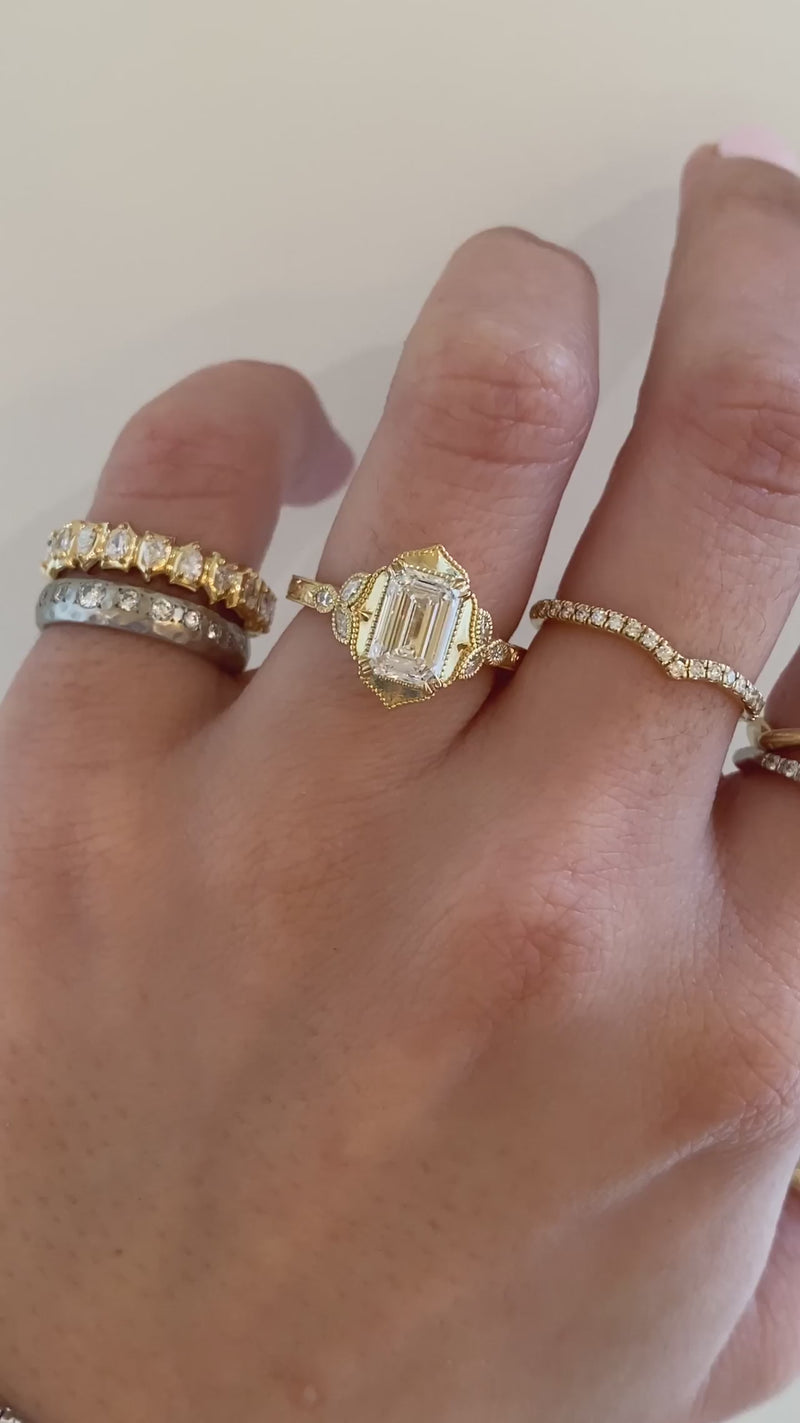 caption:Shown with 1.5ct emerald cut diamond in 18k yellow gold 