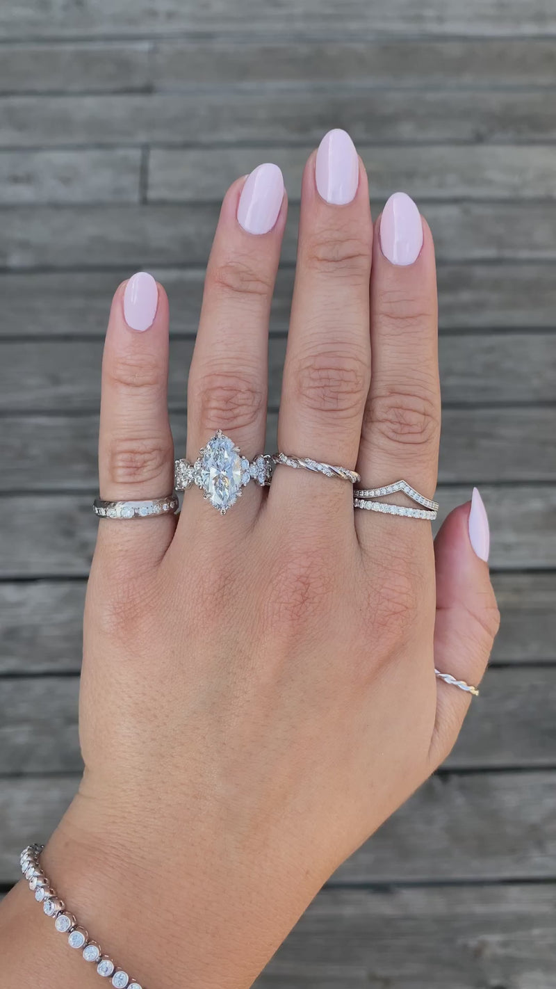 caption:Shown with 3ct marquise diamond in platinum