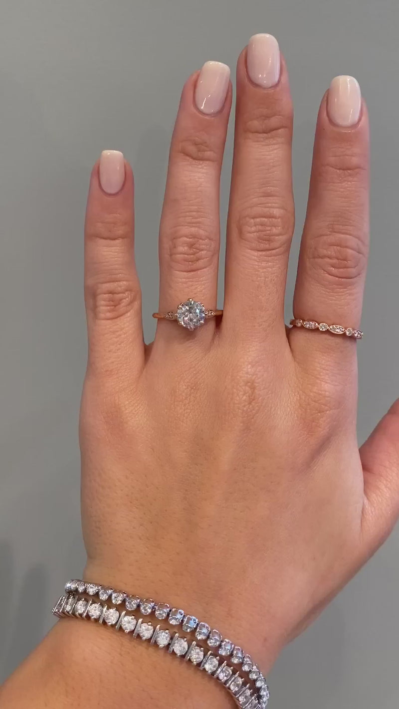 caption:Shown with 1.2ct round diamond in 14k rose gold