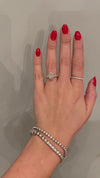 caption:Shown with 1.5ct oval diamond in platinum