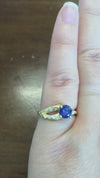caption:Shown with round blue sapphire in yellow gold