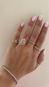 caption:Shown with 4ct oval diamond in 18k yellow gold