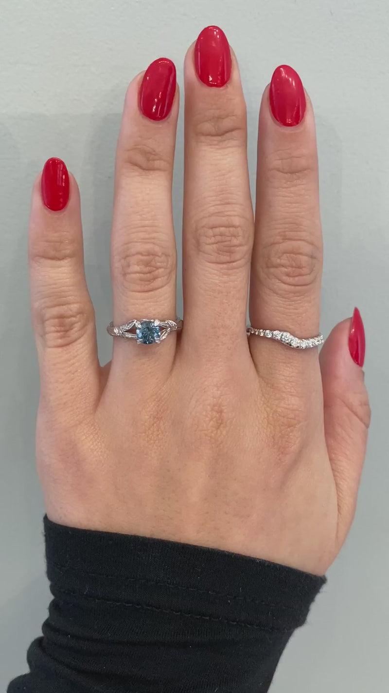 caption:Shown with 0.89ct round Montana sapphire in 14k white gold