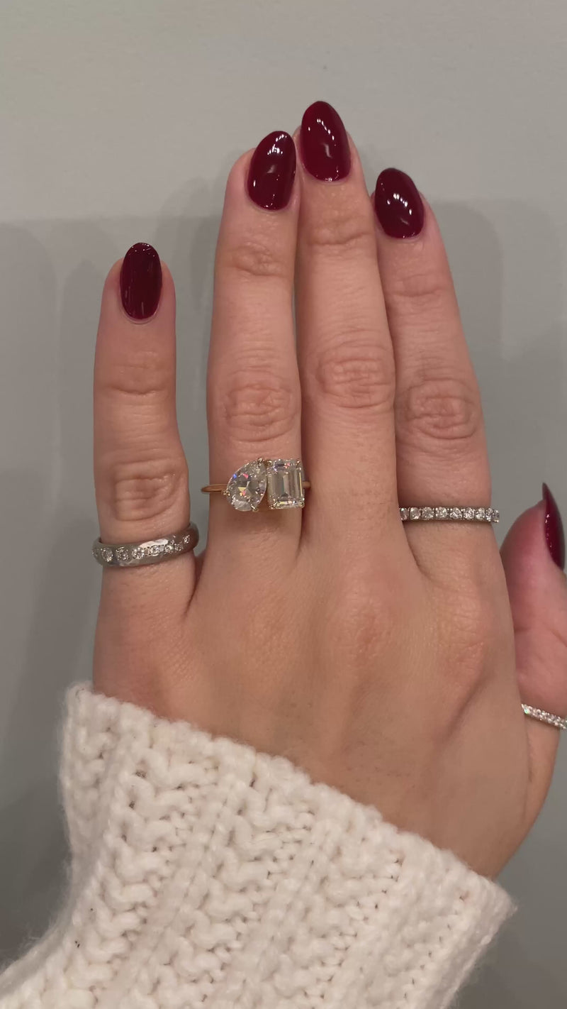 caption:Shown with 1.2ct pear & 1.75ct emerald cut diamonds in yellow gold