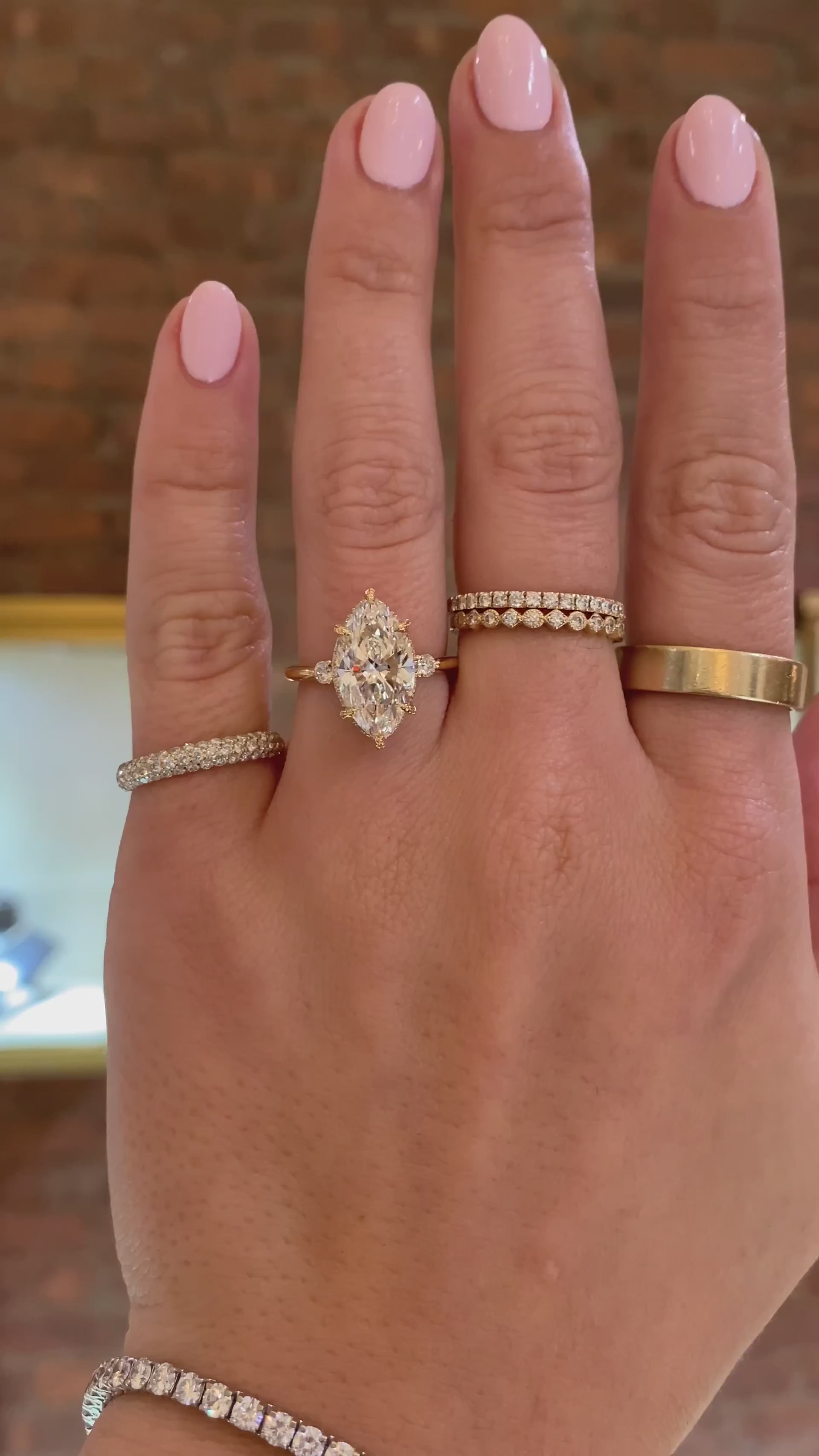 caption:Shown with 3ct marquise in 18k yellow gold 