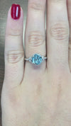 caption:Shown with 2.2ct medicine wheel cut aquamarine in platinum