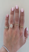 caption:Shown with 2.5ct marquise diamond in 14k yellow gold