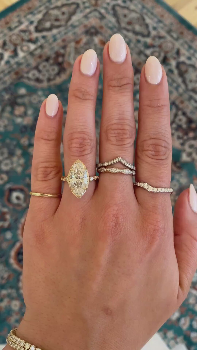 caption:Shown with 4ct marquise diamond in 14k yellow gold