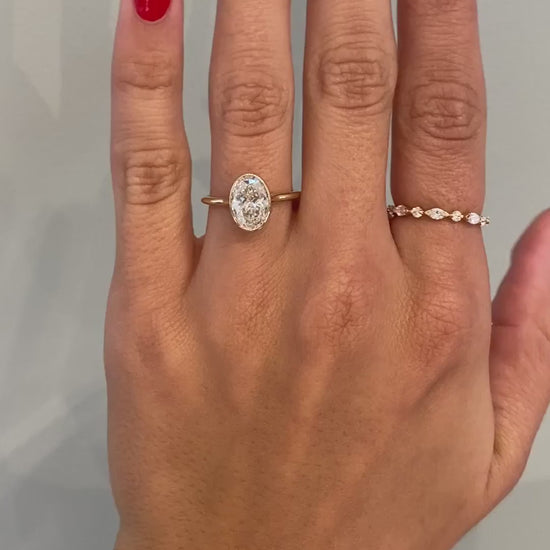 caption:Shown with a 2ct oval in 14k yellow gold