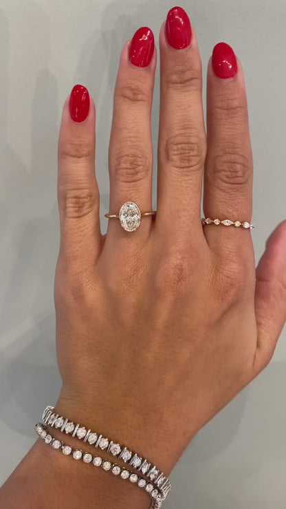 caption:Shown with a 2ct oval in 14k yellow gold