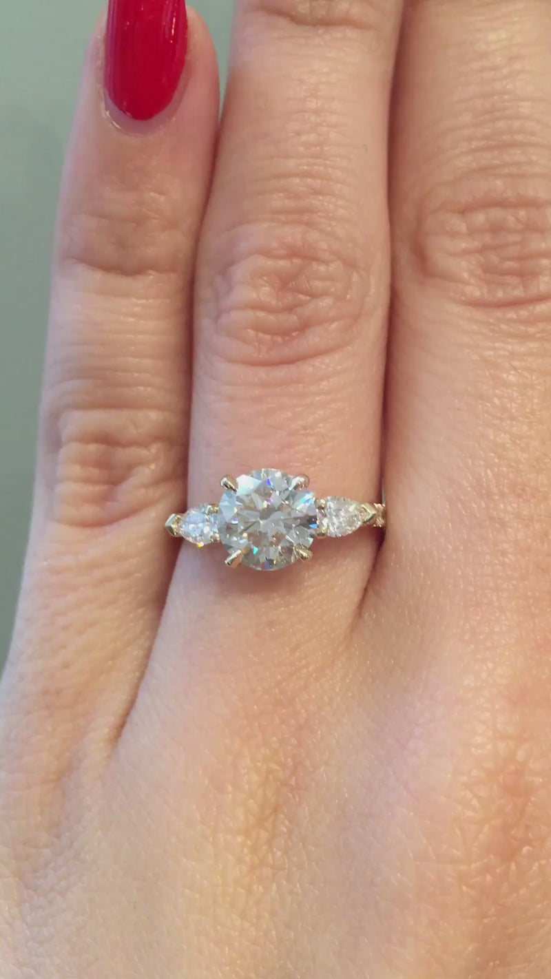 caption:Shown with 1.5ct round diamond in 14k yellow gold