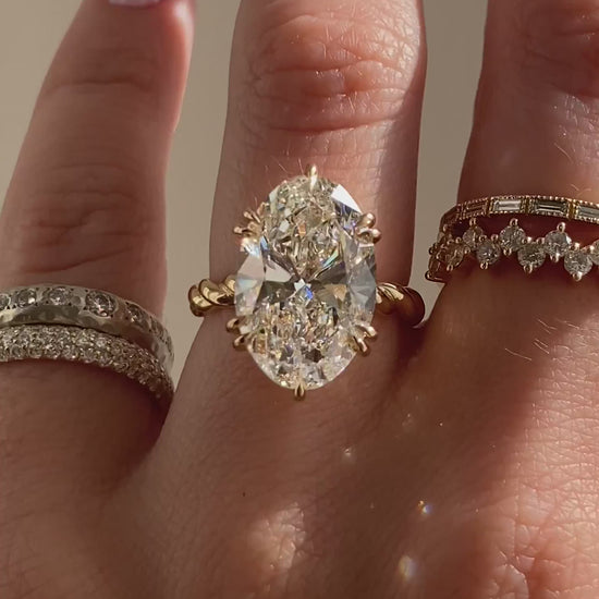 caption:Shown with 7ct oval in 18k yellow gold