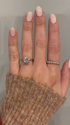 caption:Shown with 2.2ct round diamond