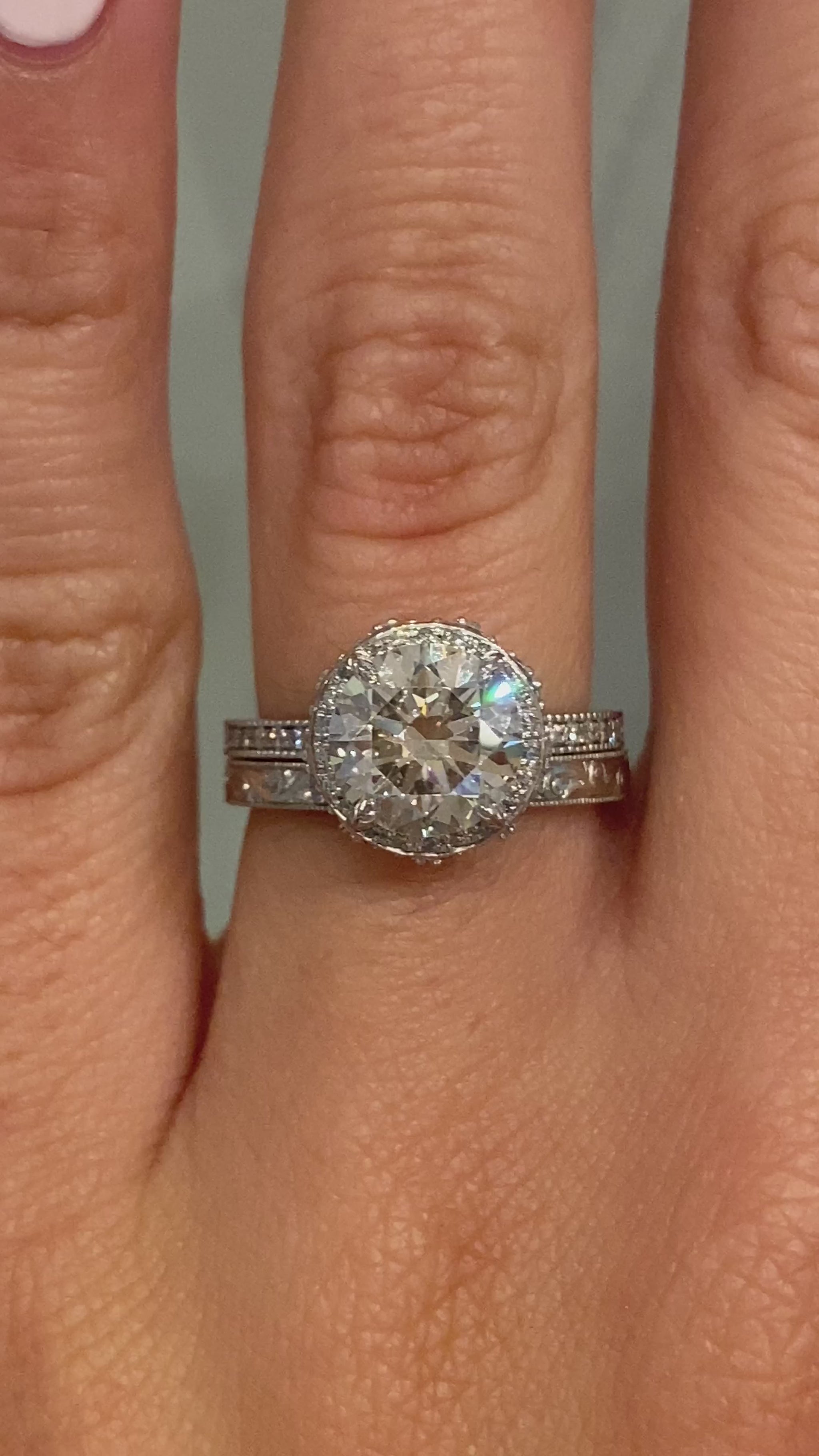 caption:Shown with 2.0ct round cut diamond, paired with Raynee wedding band (sold separately)