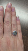 caption:Shown with star cut grey diamond in platinum