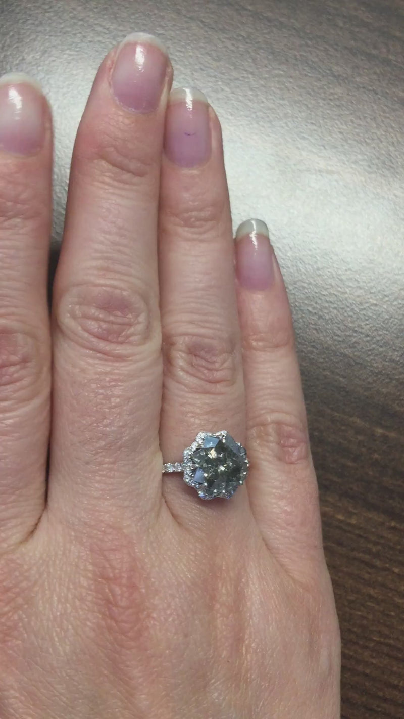 caption:Shown with star cut grey diamond in platinum