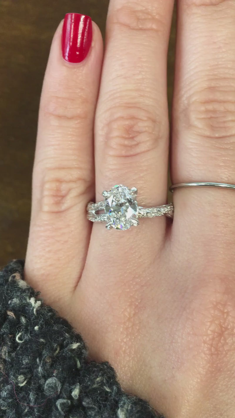 caption:Shown with 1.4ct oval diamond in platinum